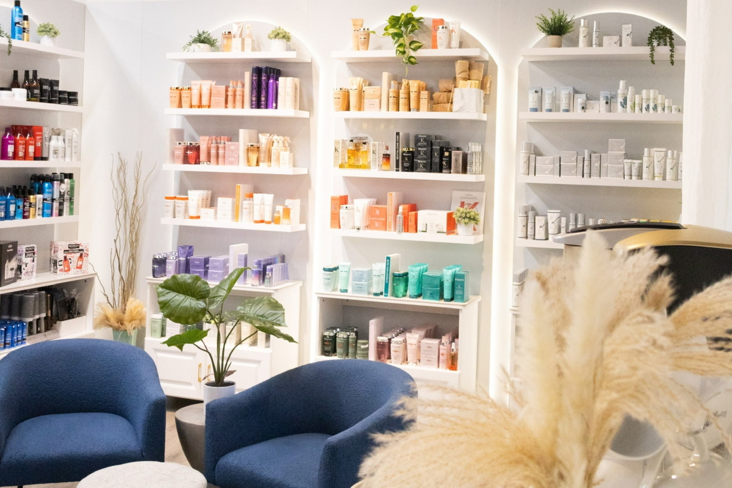 Haircare products on illuminated salon shelves