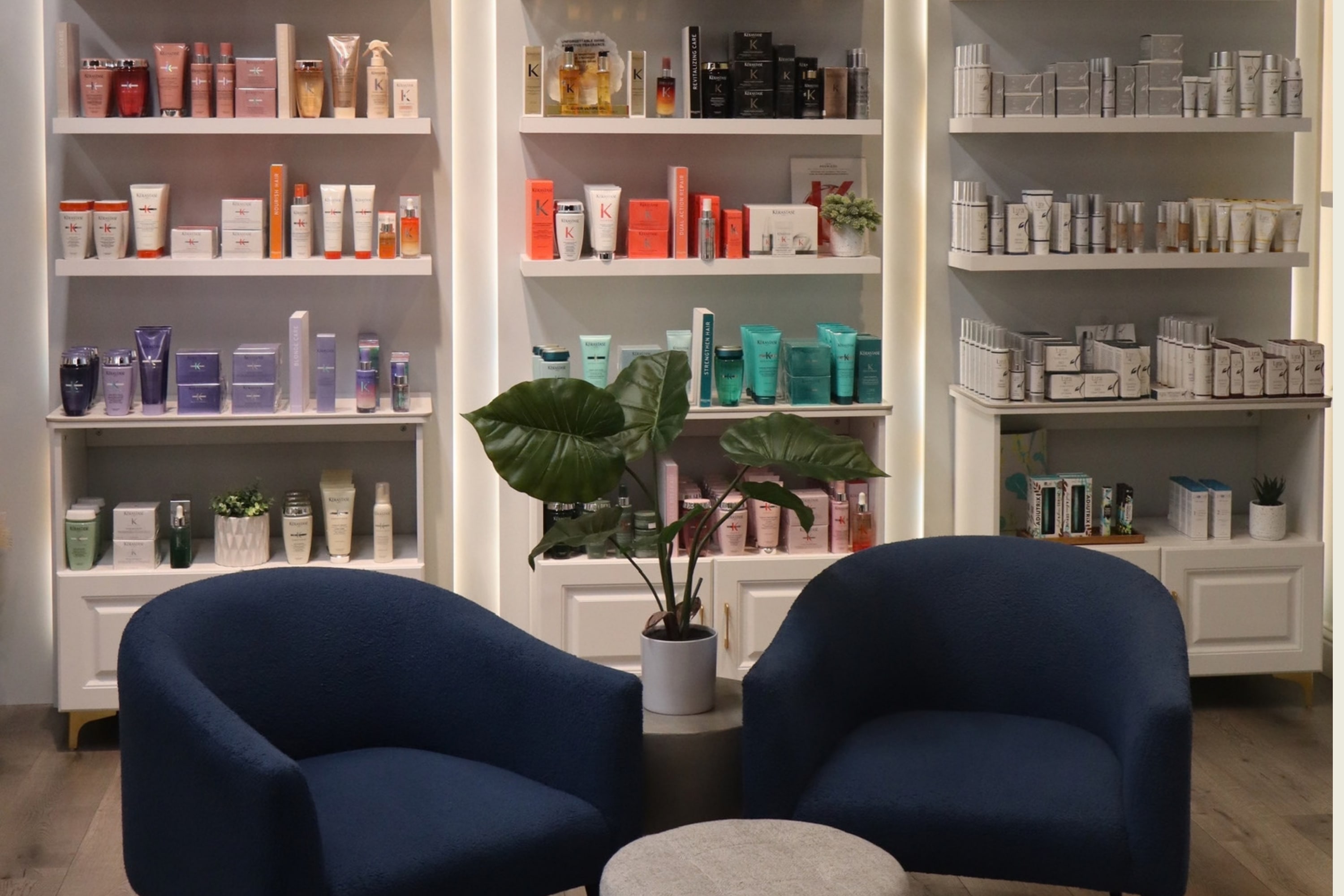 Salon seating beside the haircare retail display